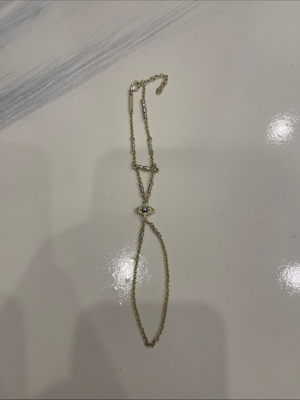 NEVER WORN Kendra Scott Gold Evil Eye Hand Chain Bracelet with Blue Center